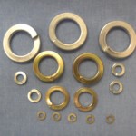 Single coil flat section washers
